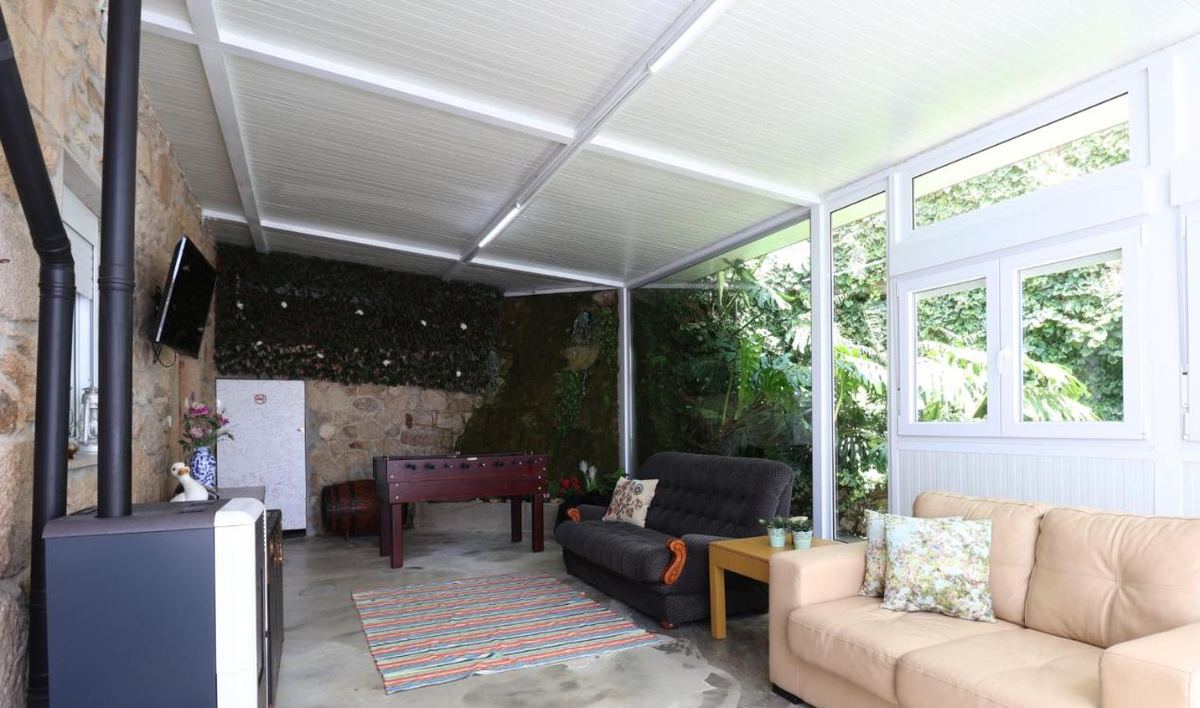 Jardim de inverno envidraçado com matraquilhos
